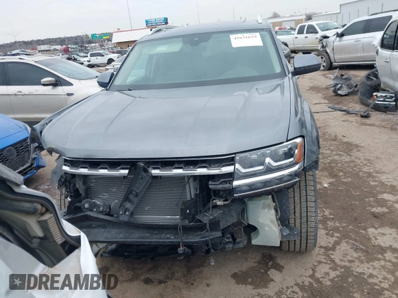 2019 Volkswagen Atlas SE with VIN 1V2WR2CA2KC581212, listed as a IAAI auction lot 41631619 with 122,160 mi miles and . Bid and sale history available at DreamBid. Image 13.