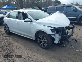 2021 Volkswagen Passat SE z VIN 1VWSA7A38MC002586, wystawiony jako IAAI lot #42062682 z przebiegiem 61 656 mil mil oraz . Historia ofert i sprzedaży dostępna na DreamBid. Obrazek 1.