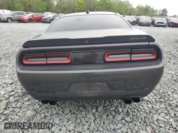 2018 Dodge Challenger T/A with VIN 2C3CDZBT2JH219413, listed as a Copart auction lot 53278745 with 133,257 mi miles and Salvage title. Bid and sale history available at DreamBid. Image 6.