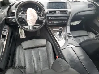 2015 BMW 6 Series 640i xDrive z VIN WBA6B8C58FD453291, wystawiony jako Copart lot #45531765 z przebiegiem 93 666 mil mil oraz Szkoda całkowita • Salvage title. Historia ofert i sprzedaży dostępna na DreamBid. Obrazek 8.