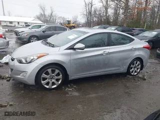 2012 Hyundai Elantra GLS with VIN KMHDH4AE6CU448280, listed as a IAAI auction lot 41548514 with 211,089 mi miles. Bid and sale history available at carsss.com. Image 14.