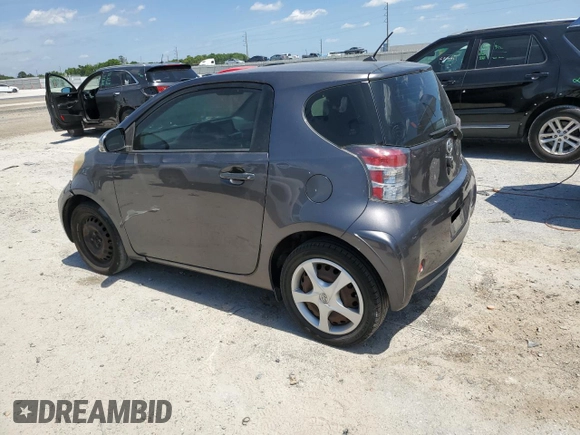 2012 Scion iQ with VIN JTNJJXB06CJ011117, listed as a Copart auction lot 52694345 with 94,547 mi miles and Salvage Title. Bid and sale history available at carsss.com. Image 2.