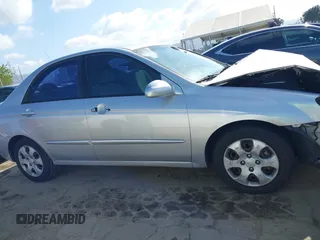 2005 Kia Spectra LX with VIN KNAFE122355139496, listed as a IAAI auction lot 41955660 with 58,676 mi miles. Bid and sale history available at carsss.com. Image 14.