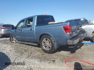 2011 Nissan Titan Pro-4X with VIN 1N6BA0ECXBN302004, listed as a Copart auction lot 89343945 with 427,682 mi miles and Salvage title. Bid and sale history available at DreamBid. Image 2.