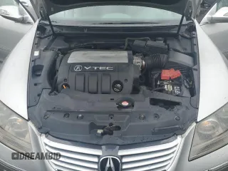 2006 Acura RL z VIN JH4KB16526C005279, wystawiony jako Copart lot #57917835 z przebiegiem 145 737 mil mil oraz Szkody całkowita. Historia ofert i sprzedaży dostępna na DreamBid. Obrazek 11.