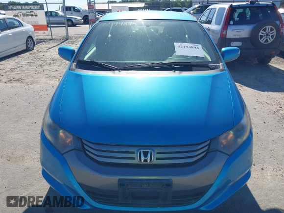 2010 Honda Insight EX with VIN JHMZE2H74AS013148, listed as a IAAI auction lot 42194894 with 114,885 mi miles and . Bid and sale history available at DreamBid. Image 6.