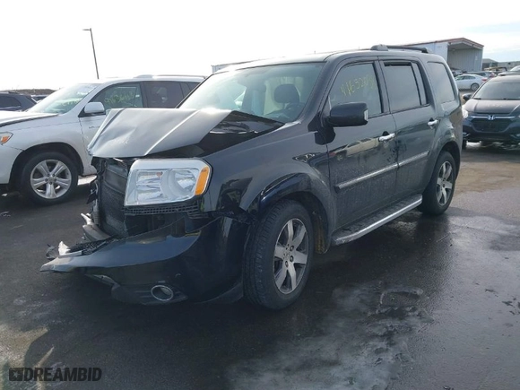 2015 Honda Pilot Touring with VIN 5FNYF4H90FB009528, listed as a IAAI auction lot 41652038 with 178,811 mi miles. Bid and sale history available at carsss.com. Image 2.