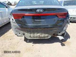 2021 Kia Forte LXS z VIN 3KPF24AD2ME338591, wystawiony jako IAAI lot #42231929 z przebiegiem 86 008 mil mil oraz . Historia ofert i sprzedaży dostępna na DreamBid. Obrazek 6.