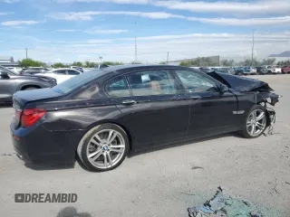 2015 BMW 7 Series 750Li with VIN WBAYE8C59FD781223, listed as a Copart auction lot 54944265 with 125,203 mi miles and Salvage title. Bid and sale history available at DreamBid. Image 3.
