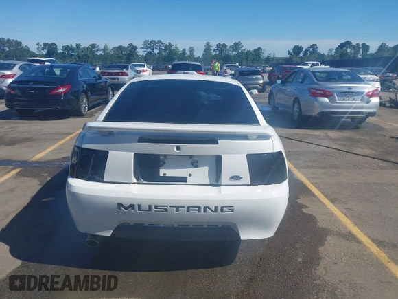 2004 Ford Mustang Standard z VIN 1FAFP40654F229283, wystawiony jako IAAI lot #42309648 z przebiegiem 164 610 mil mil oraz . Historia ofert i sprzedaży dostępna na DreamBid. Obrazek 17.