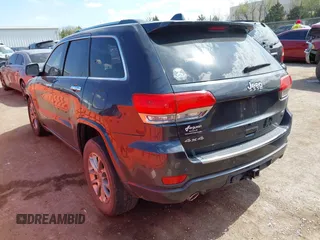 2015 Jeep Grand Cherokee Overland with VIN 1C4RJFCG6FC831641, listed as a IAAI auction lot 41877680 with 143,568 mi miles. Bid and sale history available at carsss.com. Image 3.
