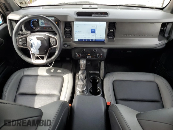 2024 Ford Bronco Big Bend z VIN 1FMDE7BH7RLA10353, wystawiony jako Copart lot #54209345 z przebiegiem 10 606 mil mil oraz Szkoda całkowita • Salvage title. Historia ofert i sprzedaży dostępna na DreamBid. Obrazek 8.
