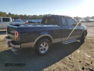 2002 Ford F-150 XL with VIN 1FTRX17L72NA39909, listed as a Copart auction lot 76376994 with 175,926 mi miles and Salvage title. Bid and sale history available at DreamBid. Image 3.
