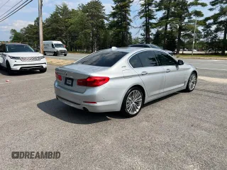2018 BMW 5 Series 530e with VIN WBAJA9C59JG623166, listed as a Copart auction lot 60938995 with 82,070 mi miles and Clean title. Bid and sale history available at DreamBid. Image 4.
