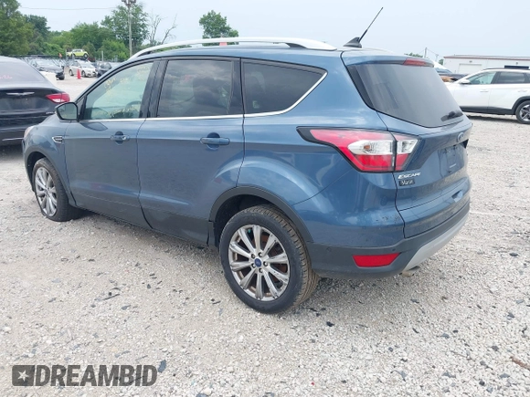 2018 Ford Escape Titanium z VIN 1FMCU0J91JUC00941, wystawiony jako IAAI lot #42679897 z przebiegiem 110 884 mil mil oraz . Historia ofert i sprzedaży dostępna na DreamBid. Obrazek 3.
