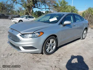 2018 Ford Fusion Hybrid S with VIN 3FA6P0UU8JR244912, listed as a IAAI auction lot 41742940 with 65,885 mi miles. Bid and sale history available at carsss.com. Image 19.