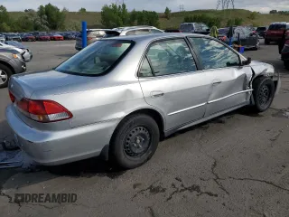 2002 Honda Accord LX z VIN JHMCG56442C016427, wystawiony jako Copart lot #57806335 z przebiegiem 176 816 mil mil oraz Szkoda całkowita • Salvage title. Historia ofert i sprzedaży dostępna na DreamBid. Obrazek 3.