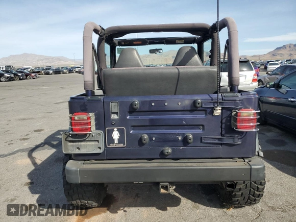1999 Jeep Wrangler Sport with VIN 1J4FY19S0XP467587, listed as a Copart auction lot 51339415 with 168,142 mi miles and Clean Title. Bid and sale history available at carsss.com. Image 6.