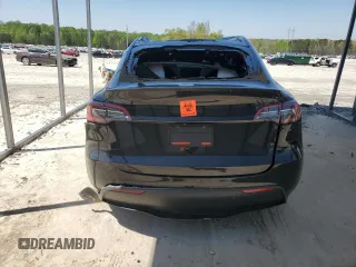 2022 Tesla Model Y Performance z VIN 7SAYGDEF2NF448013, wystawiony jako Copart lot #52323435 z przebiegiem Nie podano mil oraz Nie do naprawy. Historia ofert i sprzedaży dostępna na DreamBid. Obrazek 6.