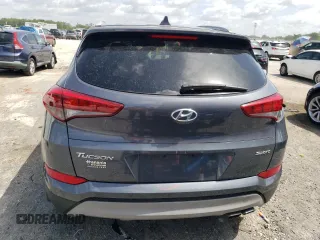 2018 Hyundai Tucson Sport z VIN KM8J33ALXJU764322, wystawiony jako Copart lot #59739985 z przebiegiem 79 882 mil mil oraz Szkoda całkowita • Salvage title. Historia ofert i sprzedaży dostępna na DreamBid. Obrazek 6.