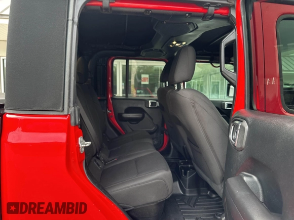 2020 Jeep Gladiator Sport S z VIN 1C6HJTAG7LL126346, wystawiony jako IAAI lot #42711702 z przebiegiem 147 263 mil mil oraz . Historia ofert i sprzedaży dostępna na DreamBid. Obrazek 8.
