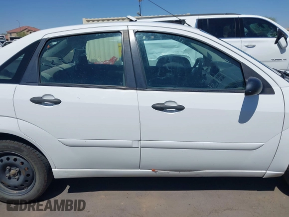 2007 Ford Focus S with VIN 1FAFP34N57W106082, listed as a IAAI auction lot 42594888 with 279,965 mi miles and . Bid and sale history available at DreamBid. Image 13.