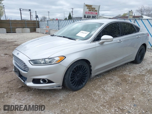 2014 Ford Fusion Titanium with VIN 3FA6P0K92ER367576, listed as a IAAI auction lot 42062207 with 171,351 mi miles. Bid and sale history available at carsss.com. Image 2.