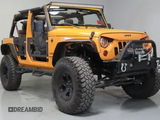 2012 Jeep Wrangler Unlimited Sport with VIN 1C4BJWDG1CL260717, listed as a Copart auction lot 65053075 with 101,396 mi miles and Salvage title. Bid and sale history available at DreamBid. Image 1.