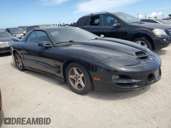 2000 Pontiac Firebird Formula z VIN 2G2FV22G9Y2140113, wystawiony jako Copart lot #76135324 z przebiegiem Nie podano mil oraz Szkoda całkowita • Salvage title. Historia ofert i sprzedaży dostępna na DreamBid. Obrazek 4.