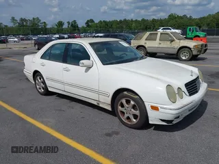 2002 Mercedes-Benz E-Class with VIN WDBJF65J22B432263, listed as a IAAI auction lot 42130545 with 220,852 mi miles. Bid and sale history available at carsss.com. Image 1.