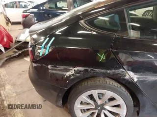 2022 Tesla Model 3 with VIN 5YJ3E1EA4NF187113, listed as a IAAI auction lot 41712331 with 81,879 mi miles and . Bid and sale history available at DreamBid. Image 24.