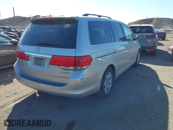 2008 Honda Odyssey Touring with VIN 5FNRL38888B005406, listed as a IAAI auction lot 41689635 with 164,340 mi miles. Bid and sale history available at carsss.com. Image 4.