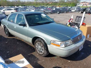 2005 Mercury Grand Marquis GS with VIN 2MEFM74W35X653175, listed as a IAAI auction lot 42005035 with 142,935 mi miles and . Bid and sale history available at DreamBid. Image 1.