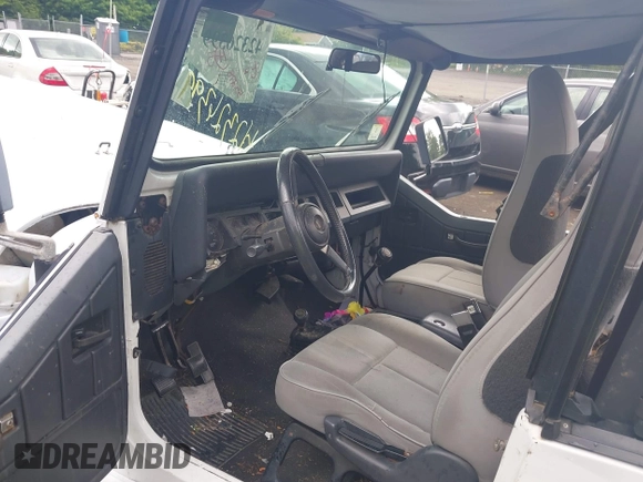 1995 Jeep Wrangler z VIN 1J4FY29S1SP206760, wystawiony jako IAAI lot #42326399 z przebiegiem 55 278 mil mil oraz . Historia ofert i sprzedaży dostępna na DreamBid. Obrazek 5.
