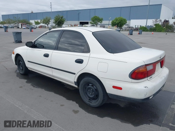 1997 Mazda Protege DX with VIN JM1BC1417V0156858, listed as a IAAI auction lot 42118339 with 187,673 mi miles and . Bid and sale history available at DreamBid. Image 3.