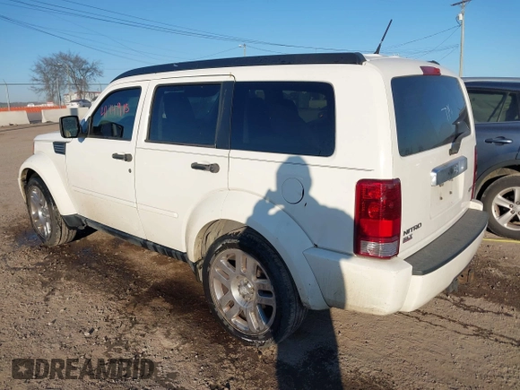 2007 Dodge Nitro SLT with VIN 1D8GU58K67W692313, listed as a IAAI auction lot 41441915 with 195,521 mi miles. Bid and sale history available at carsss.com. Image 3.