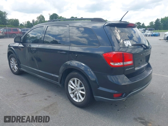 2013 Dodge Journey SXT with VIN 3C4PDCBG6DT501871, listed as a IAAI auction lot 42553305 with 184,226 mi miles and . Bid and sale history available at DreamBid. Image 3.