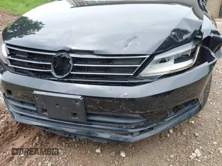 2017 Volkswagen Jetta S z VIN 3VW2B7AJ3HM303198, wystawiony jako IAAI lot #42651056 z przebiegiem 126 253 mil mil oraz . Historia ofert i sprzedaży dostępna na DreamBid. Obrazek 19.