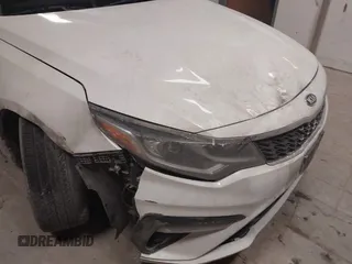 2019 Kia Optima LX with VIN 5XXGT4L39KG280666, listed as a IAAI auction lot 41436121 with 121,531 mi miles. Bid and sale history available at carsss.com. Image 6.