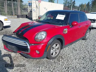 2015 MINI Hardtop 4 Door z VIN WMWXS5C59FT829635, wystawiony jako IAAI lot #42046985 z przebiegiem 171 731 mil mil oraz . Historia ofert i sprzedaży dostępna na DreamBid. Obrazek 2.
