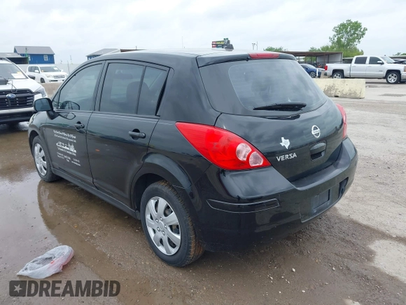 2009 Nissan Versa 1.8 SL with VIN 3N1BC13E79L393141, listed as a IAAI auction lot 42124776 with 233,137 mi miles. Bid and sale history available at carsss.com. Image 3.