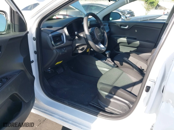 2023 Kia Rio S with VIN 3KPA24AD4PE573279, listed as a IAAI auction lot 41885298 with 11,561 mi miles. Bid and sale history available at carsss.com. Image 18.