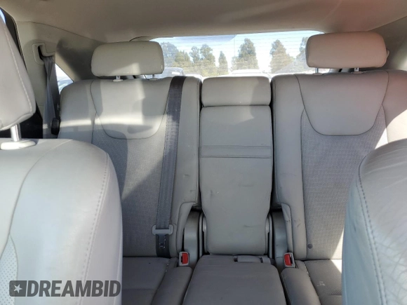 2010 Lexus RX 450h with VIN JTJBC1BA3A2014134, listed as a Copart auction lot 56025275 with 130,471 mi miles and Salvage title. Bid and sale history available at DreamBid. Image 10.