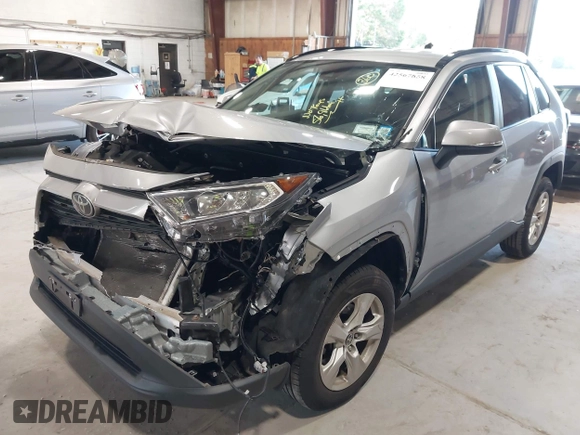 2021 Toyota RAV4 XLE with VIN 2T3P1RFV5MC180890, listed as a IAAI auction lot 42567858 with 56,961 mi miles and . Bid and sale history available at DreamBid. Image 16.