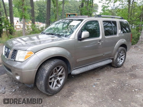 2005 Nissan Pathfinder SE z VIN 5N1AR18WX5C748572, wystawiony jako IAAI lot #42180475 z przebiegiem 291 301 mil mil oraz . Historia ofert i sprzedaży dostępna na DreamBid. Obrazek 19.