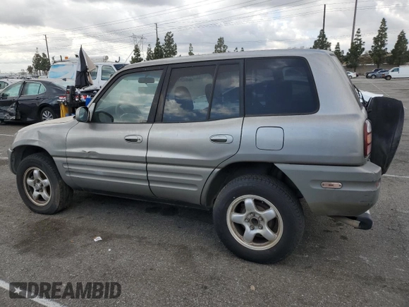 1999 Toyota RAV4 with VIN JT3GP10V0X7054819, listed as a Copart auction lot 44864015 with 140,095 mi miles and Salvage Title. Bid and sale history available at DreamBid. Image 2.