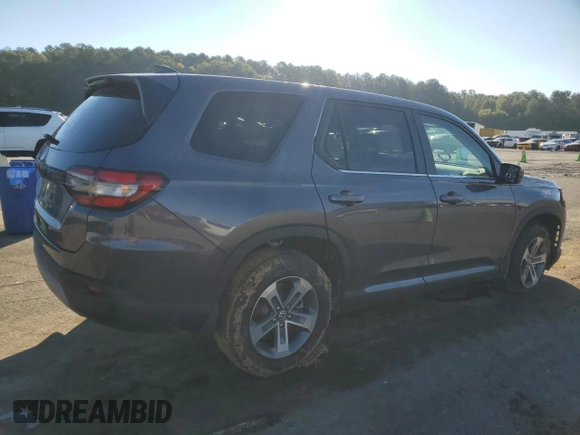 2024 Honda Pilot EX-L 8 Passenger with VIN 5FNYG1H49RB041981, listed as a Copart auction lot 73479824 with 8,758 mi miles and Salvage Title. Bid and sale history available at carsss.com. Image 3.