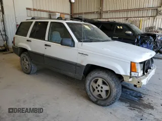 1995 Jeep Grand Cherokee Laredo with VIN 1J4GZ58Y0SC572757, listed as a Copart auction lot 52733375 with 160,588 mi miles and Salvage Title. Bid and sale history available at carsss.com. Image 4.