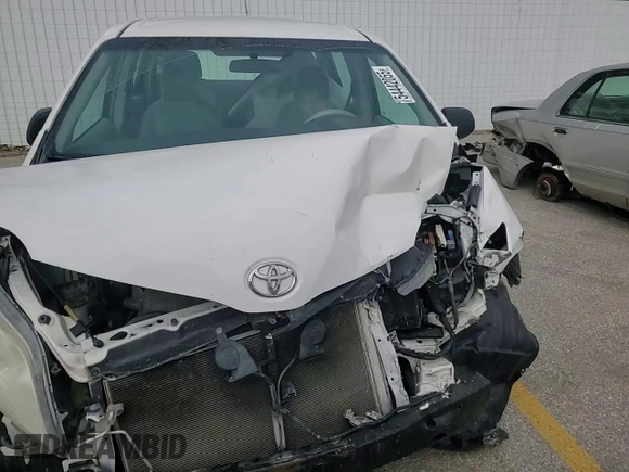 2012 Toyota Sienna with VIN 5TDZK3DC6CS244891, listed as a Copart auction lot 54442055 with 137,680 mi miles and Salvage title. Bid and sale history available at DreamBid. Image 15.