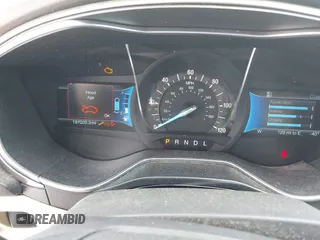 2015 Ford Fusion SE Hybrid with VIN 3FA6P0LU7FR199065, listed as a IAAI auction lot 41944181 with 197,020 mi miles. Bid and sale history available at carsss.com. Image 7.